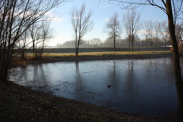 Frozen lake in morning sun