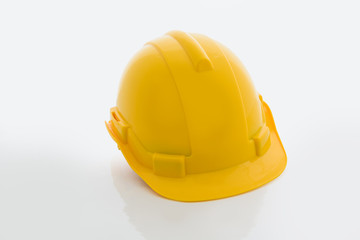 Fototapeta premium Yellow safety helmet on white background