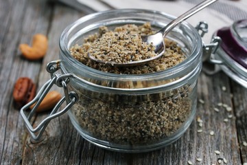 Homemade health Mix  / Protein powder in a glass jar, selective focus
