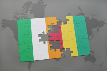 puzzle with the national flag of ireland and guinea on a world map