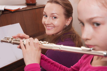 woman teaching accompanied