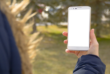 Empty Screen Smartphone Holding by a Woman