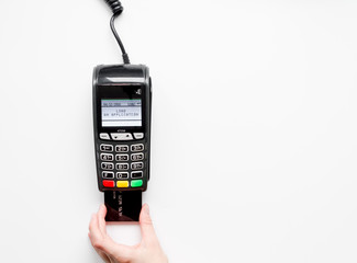 payment terminal with card on white background top view