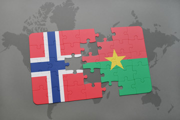 puzzle with the national flag of norway and burkina faso on a world map