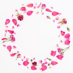 Round frame of flowers on background. Flat lay. Top view.