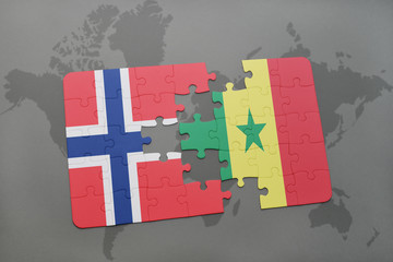 puzzle with the national flag of norway and senegal on a world map