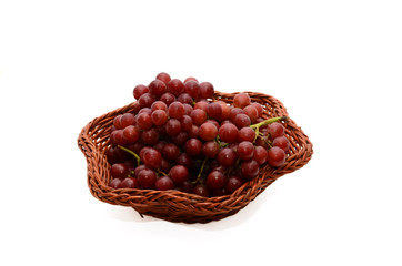 Red Grapes in Basket Isolated On White Background