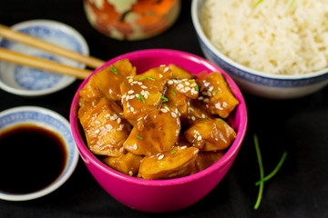 Chinese style sweet and sour chicken with sesame seeds