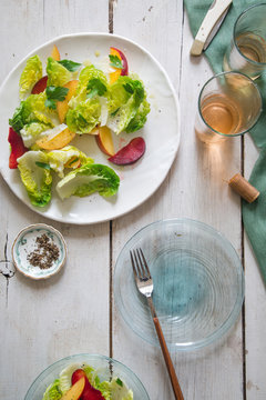 Summer Salad being served on a white farm table