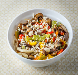 Salad from fried vegitables mushrooms and fresh feta cheese