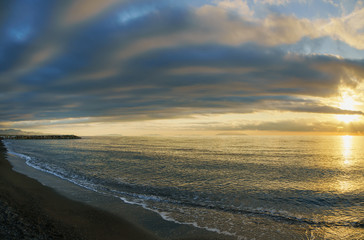 Maremma beach coast and Elba island on horizon. Cecina, Tuscany,