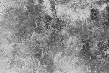 Dark grunge textured cement wall closeup