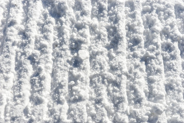 Snowmobile track marks on the snow, snow background