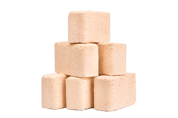 Wood briquettes isolated on white background.