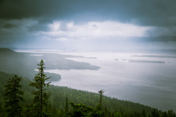 A beautiful panorama of lake and forest from Koli National park peaks