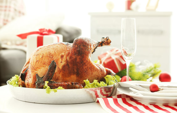 Tasty Turkey Prepared For Christmas Dinner, On Blurred Background