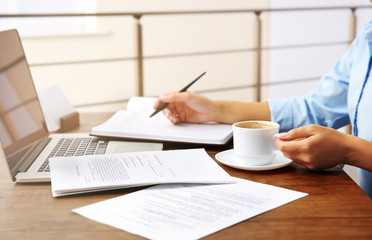 Fototapeta premium Lawyer sitting at the table with papers
