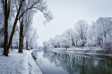 Naklejka na ściany i meble Small river in winter