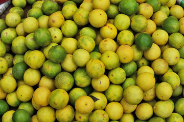 Fresh lemons limes texture background