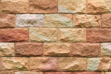 Sandstone brick wall texture background pattern and color