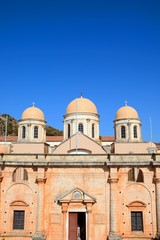 Elevated view of the front of the Agia Triada monastery, Crete.