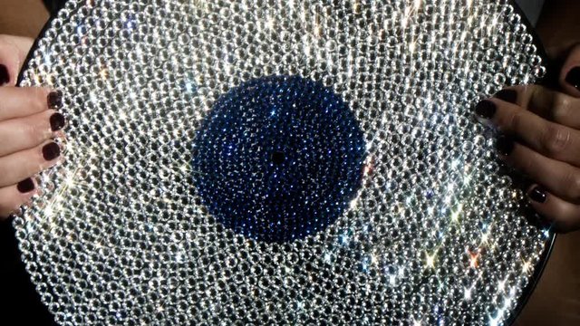 female dancing with a crystal covered vinyl