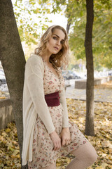 beautiful woman walking in autumn Park