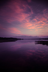A beautiful, colorful summer sunset over the lake in Finland