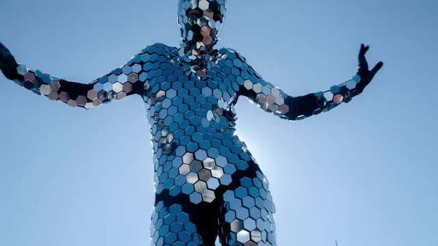 person dances in amazing discoball mirror costume 