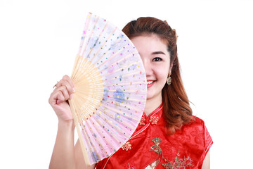 Asian Chinese woman in Traditional Chinese holding blow