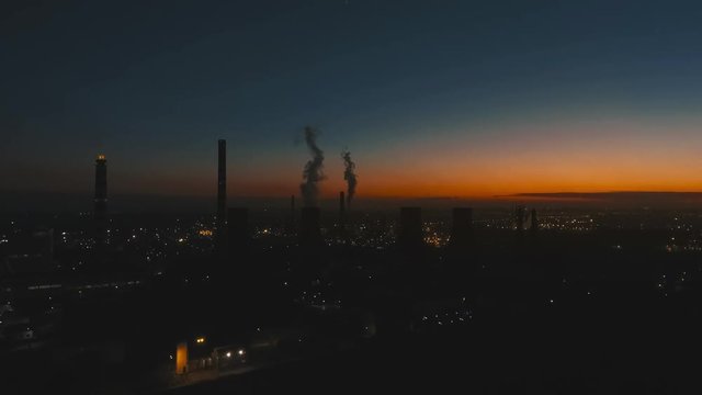 Aerial view oil refinery at sunset
