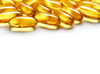 Close up heap of capsules Omega 3 on white background. Copy space for your text, high resolution product. Health care concept