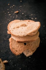 Single stack from few bun rings on black plate