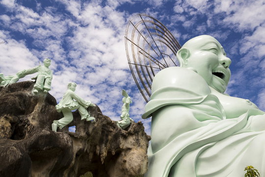 Laughing Buddha statue near Linh An Tu Temple, Dalat, Vietnam