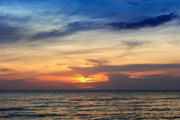 Naklejka na ściany i meble beautiful sunset over the ocean