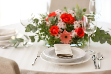 Elegant table setting with beautiful flowers