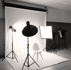 Professional photo studio with lighting equipment