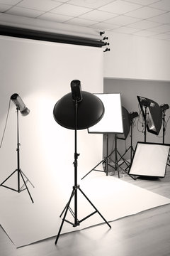 Professional photo studio with lighting equipment