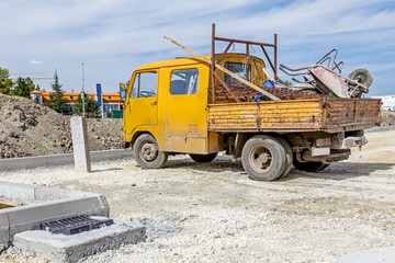 Small truck loaded with inventory from building site