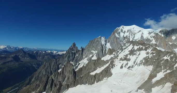 Panoramic view of Western alps whith Mount Blanc and Giant's Tooth (Dent du Geant) from Helbronner roof of europe in Aosta Valley region of Italy