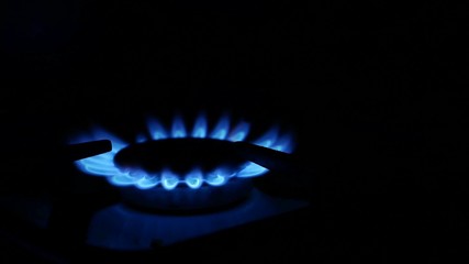 Domestic gas stove is lit blue video gas