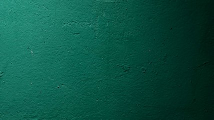 green paint stucco wall texture background old light moves on the video wall