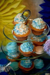 Sweet table for children's birthday party in turquoise and purple. A sense of celebration, of joy. Beautiful sweets