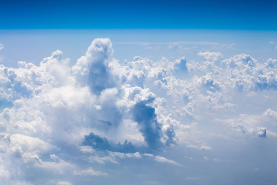 Beautiful, dramatic clouds and sky viewed from the plane. High resolution and quality
