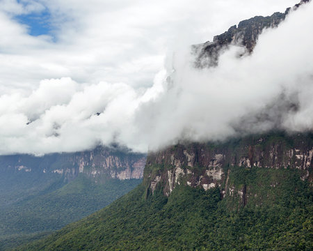 Tepyi covered with clouds in the Canaima national park (view from an airplane) - Venezuela, South America