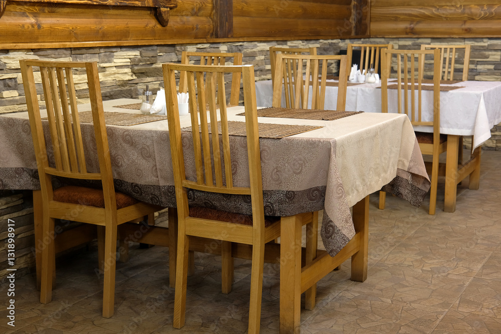 Wall mural Interior of a cafe in a wooden house