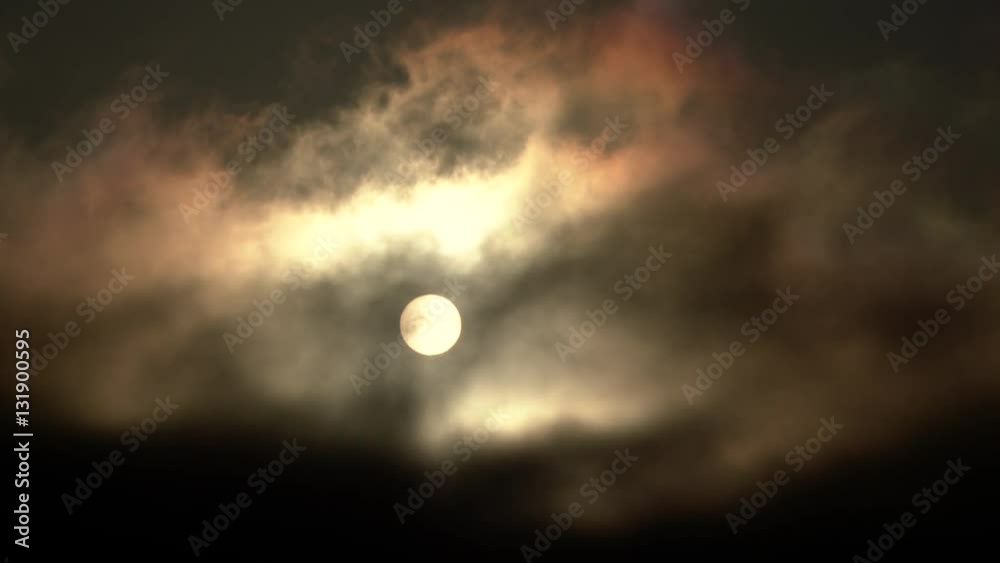 Canvas Prints dark clouds pass through sky as sun sets or use for full moon at night.