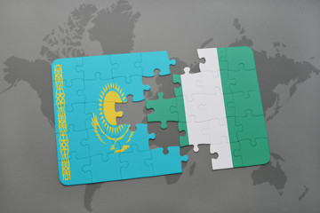puzzle with the national flag of kazakhstan and nigeria on a world map