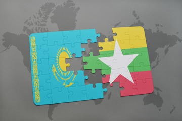 puzzle with the national flag of kazakhstan and myanmar on a world map