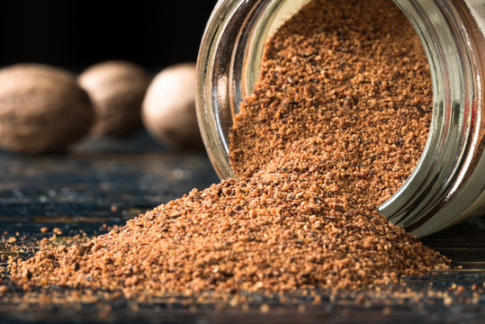 Ground Nutmeg Spilled from a Spice Jar